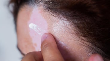 Close-up of man holding hands