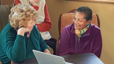 Youre never too old for the internet Shot of a group of senior women using a laptop at a senior centre